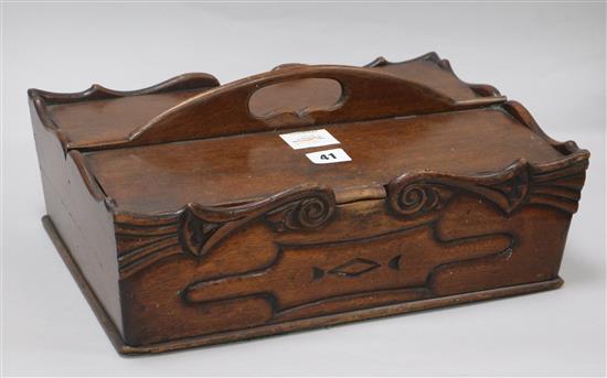 A George III mahogany two division cutlery carrier